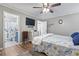 Main bedroom with an en suite bathroom, hardwood floors, and lots of natural light at 634 Cypress Ln., North Myrtle Beach, SC 29582