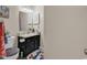 Practical bathroom featuring a dark vanity cabinet and simple decor at 6628 Mallard View Point, Myrtle Beach, SC 29588