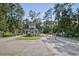 View of the entry gate to the community and landscaping with flowering plants at 6628 Mallard View Point, Myrtle Beach, SC 29588