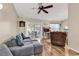 Living room featuring a sectional couch, recliner, and sliding glass doors leading to a patio at 6628 Mallard View Point, Myrtle Beach, SC 29588