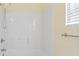 Clean white tiled shower/tub combination at 68 Voyagers Dr., Pawleys Island, SC 29585