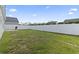 Wide expanse of green backyard area with privacy fence, ready for games and entertaining at 712 Hobonny Loop, Longs, SC 29568