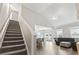 View of the open-concept living space featuring hardwood floors, high ceilings, and an adjacent dining area at 712 Hobonny Loop, Longs, SC 29568