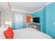 Bright bedroom with ocean view and artwork, creating a serene space at 7200 N Ocean Blvd. # 1058, Myrtle Beach, SC 29572