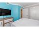 Comfortable bedroom featuring a large television and contemporary decor at 7200 N Ocean Blvd. # 1058, Myrtle Beach, SC 29572