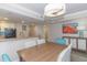 Dining room with a modern table, stylish chairs, and decor at 7200 N Ocean Blvd. # 1058, Myrtle Beach, SC 29572