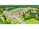 Beautiful aerial view of the community showcasing the homes, ponds, golf course and green landscape at 747 Gryffindor Dr., Longs, SC 29568