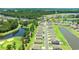 Aerial view of the community showcasing the homes, pond, and golf course at 747 Gryffindor Dr., Longs, SC 29568