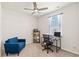 Comfortable bedroom with natural light, a cozy armchair, desk, and shelving making for an inviting workspace at 747 Gryffindor Dr., Longs, SC 29568
