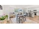 Open-concept dining area connecting to the kitchen and living room, perfect for entertaining at 747 Gryffindor Dr., Longs, SC 29568