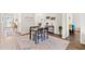Cozy dining area featuring a wood table, seating for four, and natural light at 747 Gryffindor Dr., Longs, SC 29568