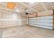 Spacious two-car garage featuring an automatic door opener and ample room for parking and storage at 747 Gryffindor Dr., Longs, SC 29568