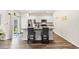Modern kitchen with stainless steel appliances, granite countertops, and a breakfast bar at 747 Gryffindor Dr., Longs, SC 29568
