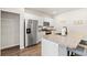 A modern kitchen with stainless steel appliances, granite countertops, and ample cabinet space at 747 Gryffindor Dr., Longs, SC 29568