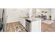 Kitchen island features granite countertops, stainless steel dishwasher and modern fixtures at 747 Gryffindor Dr., Longs, SC 29568