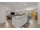 Open-concept living space with a modern kitchen, dining area, and comfortable living room at 847 Flowering Branch Ave., Little River, SC 29566