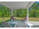 Outdoor patio area with comfortable seating and views of the surrounding landscape at 847 Flowering Branch Ave., Little River, SC 29566