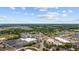 Expansive aerial view of neighborhood, highlighting nearby retail and natural landscape at 903 Ocean Pines Ct., North Myrtle Beach, SC 29582
