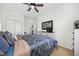 Bedroom featuring a ceiling fan, a comfortable bed, and large dresser at 903 Ocean Pines Ct., North Myrtle Beach, SC 29582