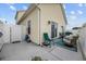Exterior view of the home with patio, privacy fence, and sliding glass doors at 903 Ocean Pines Ct., North Myrtle Beach, SC 29582