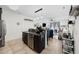 Modern open-concept kitchen with stainless steel appliances and seamless flow to the living area at 903 Ocean Pines Ct., North Myrtle Beach, SC 29582
