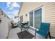 Cozy outdoor patio with grill, seating and privacy fence at 903 Ocean Pines Ct., North Myrtle Beach, SC 29582