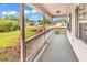 View from a covered front porch with manicured front yard and landscaping at 9616 Sullivan Dr., Murrells Inlet, SC 29576
