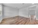 Spacious bedroom with wood-look flooring and neutral paint at 1011 Laconic Dr., Myrtle Beach, SC 29588