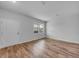 Bedroom featuring wood-look flooring, neutral paint, and a window at 1011 Laconic Dr., Myrtle Beach, SC 29588