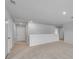 Lofted bonus room featuring neutral carpet and paint with access to multiple rooms at 1011 Laconic Dr., Myrtle Beach, SC 29588