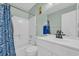 Well-lit bathroom featuring a shower and tub combination and a modern vanity at 1011 S Ocean Blvd. # 202, North Myrtle Beach, SC 29582