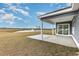 Enjoy the outdoors with a covered patio that overlooks a tranquil pond with fountain features at 1013 Woodside Dr., Conway, SC 29526
