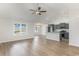Open floor plan showcases the kitchen, dining, and living areas with ample sunlight at 1013 Woodside Dr., Conway, SC 29526