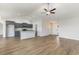 Open concept living room and kitchen featuring modern decor and ample lighting at 1013 Woodside Dr., Conway, SC 29526