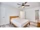 Minimalist bedroom with wood bed frame, neutral walls and wood-look floors at 1023 S Sea Bridge Ct., Surfside Beach, SC 29575