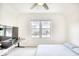 Bedroom with ceiling fan, window view, desk, and plush carpet at 1023 S Sea Bridge Ct., Surfside Beach, SC 29575