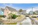 Exterior of a beach house with a water feature and bridge with nearby condos at 1023 S Sea Bridge Ct., Surfside Beach, SC 29575