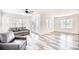 Bright living room with wood-look flooring and comfortable seating at 1023 S Sea Bridge Ct., Surfside Beach, SC 29575