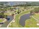 Panoramic aerial view of golf course, ponds, and trees, showcasing a picturesque landscape at 1025 World Tour Blvd. # 301, Myrtle Beach, SC 29579