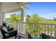 Secluded balcony with cozy seating and a stunning view of the surrounding greenery at 1025 World Tour Blvd. # 301, Myrtle Beach, SC 29579
