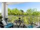 Relaxing balcony with comfortable seating overlooking lush green trees at 1025 World Tour Blvd. # 301, Myrtle Beach, SC 29579