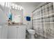 Well-lit bathroom featuring a white vanity with granite countertop, and a shower/tub combo at 1025 World Tour Blvd. # 301, Myrtle Beach, SC 29579
