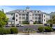 Beautiful condo complex boasting lovely landscaping, lots of parking, and multiple floors with balconies at 1025 World Tour Blvd. # 301, Myrtle Beach, SC 29579