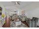 Open-concept living room with hardwood floors, high ceilings, and easy flow to the kitchen at 1025 World Tour Blvd. # 301, Myrtle Beach, SC 29579