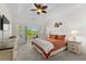 Tranquil bedroom with a king-size bed, balcony access, and plenty of natural light at 1025 World Tour Blvd. # 301, Myrtle Beach, SC 29579