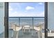 Oceanfront balcony with chairs overlooking the beach, offering serene relaxation at 1105 South Ocean Blvd. # 1008, Myrtle Beach, SC 29577