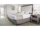 Comfortable bedroom featuring queen bed, soft lighting, and access to outdoor balcony at 1105 South Ocean Blvd. # 1008, Myrtle Beach, SC 29577