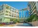 View of Coral Beach Resort entrance showing modern architecture and parking area at 1105 South Ocean Blvd. # 1008, Myrtle Beach, SC 29577