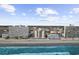 Aerial view of a coastal city with oceanfront condos and sandy beach at 1108 N Waccamaw Dr. # C-4, Garden City Beach, SC 29576