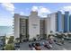 Horizon East beachfront condo complex featuring multiple floors, parking, and ocean views at 1108 N Waccamaw Dr. # C-4, Garden City Beach, SC 29576